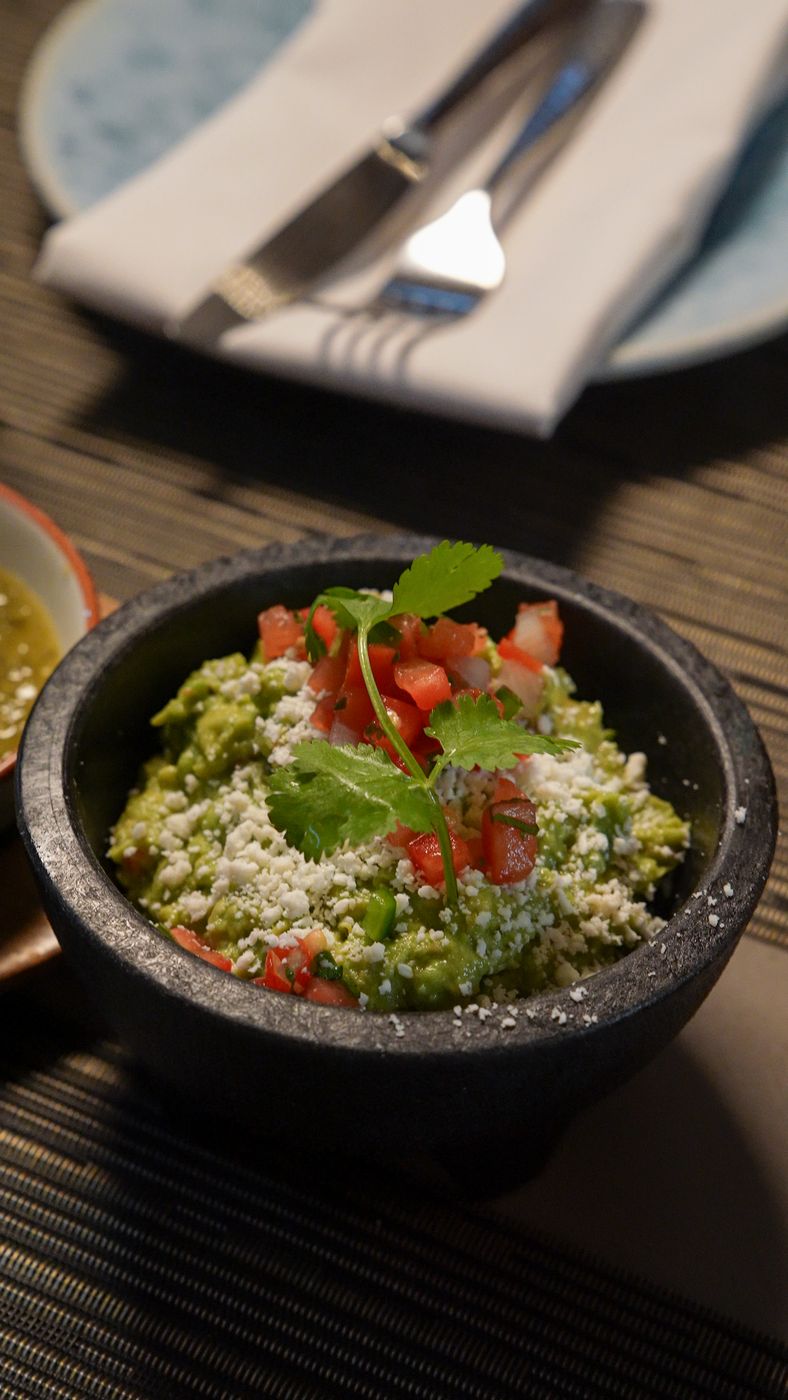 Fresh guacamole in a molcajete